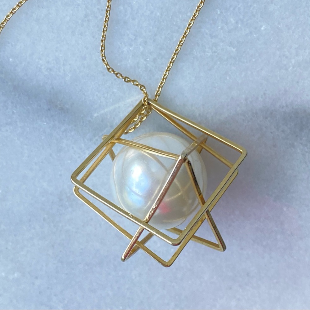 Caged Large White “Pearl” Gold Geometric Pendant